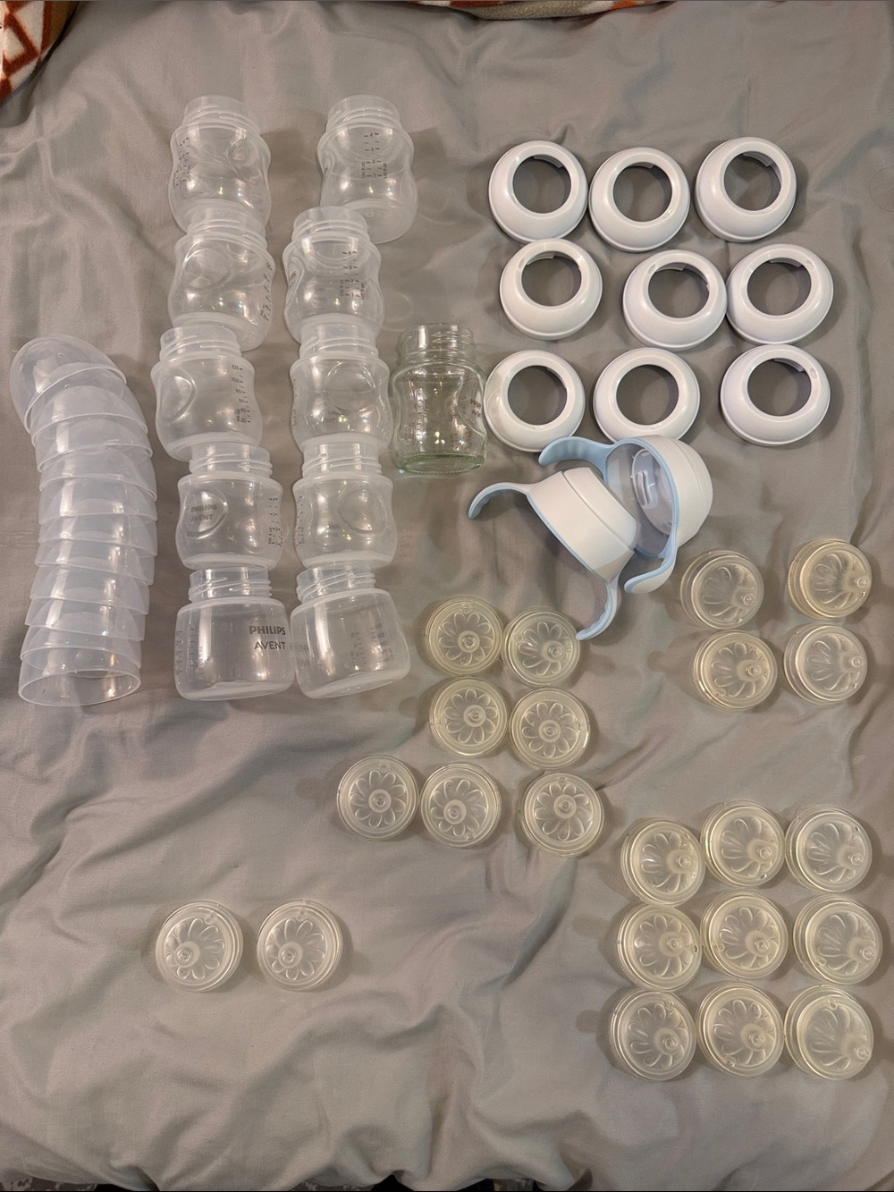 Lots of Philips Avent Bottles, nipples and covers